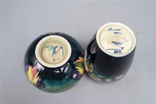 A Moorcroft leaf and berry bowl and a Clematis pattern vase, height 15cm